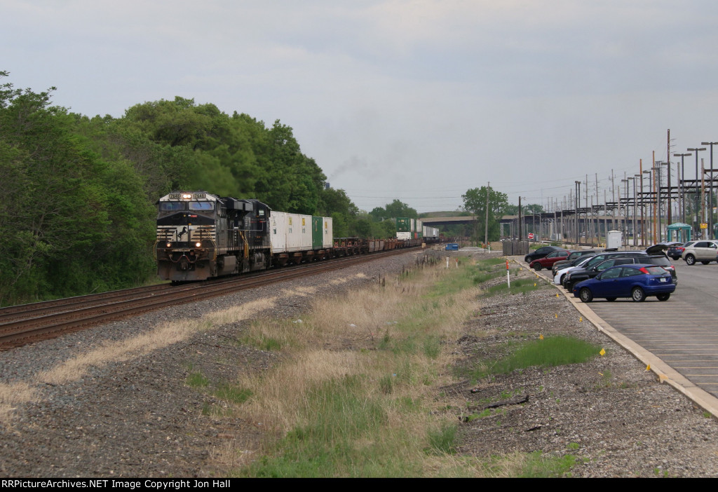 205 rolls west by the South Shore station